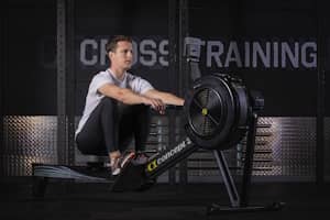 William Lan s'entranant sur rameur